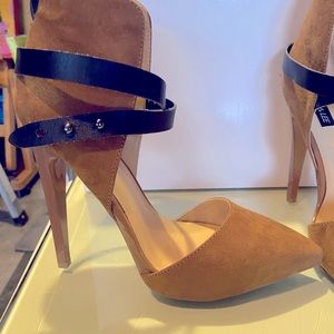 Suede brown heels with leather details. Used twice